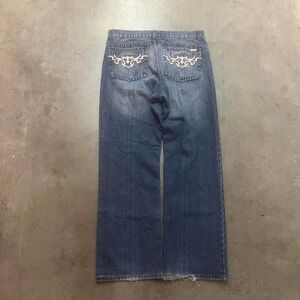 Vintage Cassini men's blue jeans baggy flare embroidered western grunge